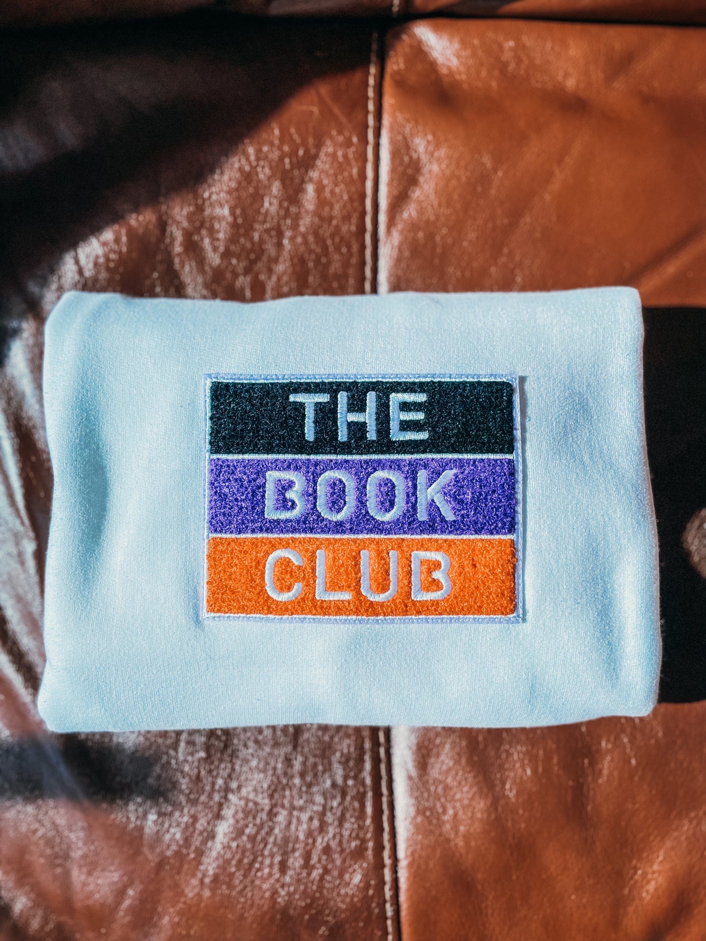 BOOK CLUB Chenille Patch Champion® Sweater