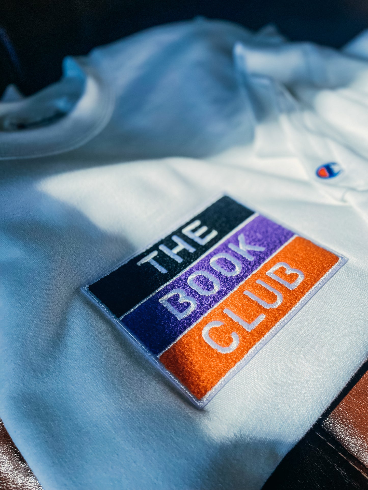 BOOK CLUB Chenille Patch Champion® Sweater